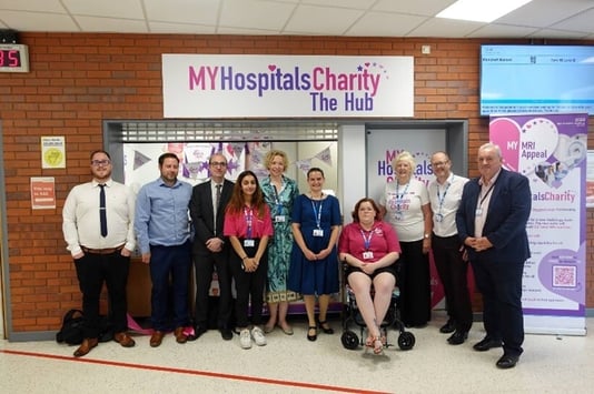Group of people from My Hospitals Charity that use Donorfy charity CRM stand at the MY Hospitals Charity Hub