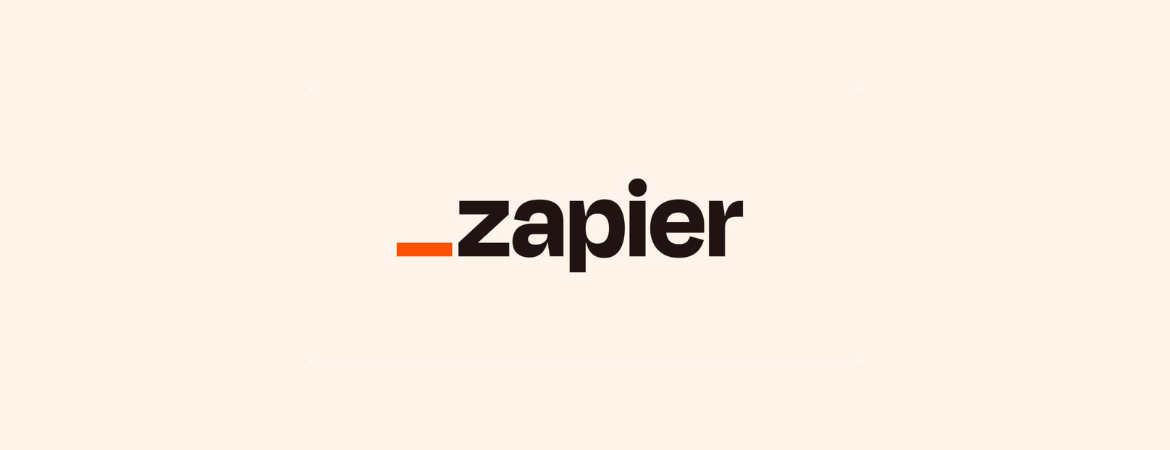 Zapier logo on a light pink background